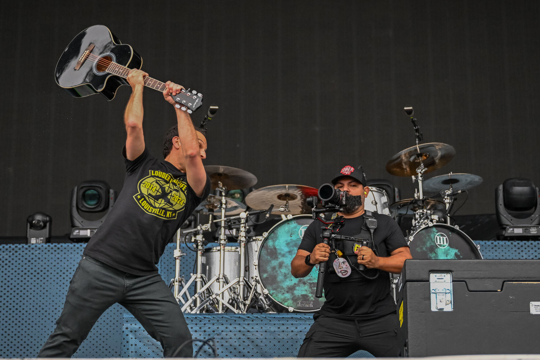 Louisville Mayor Craig Greenberg smashes guitar at Louder Than Life 2024